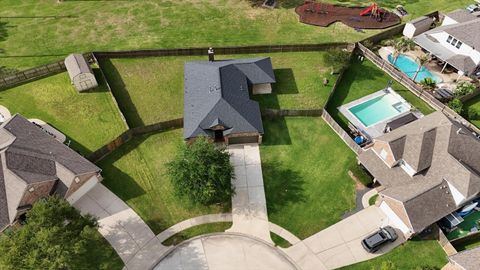 Photo of 8303 Rocky River Street, Baytown, TX 77523 (MLS # 77407193)