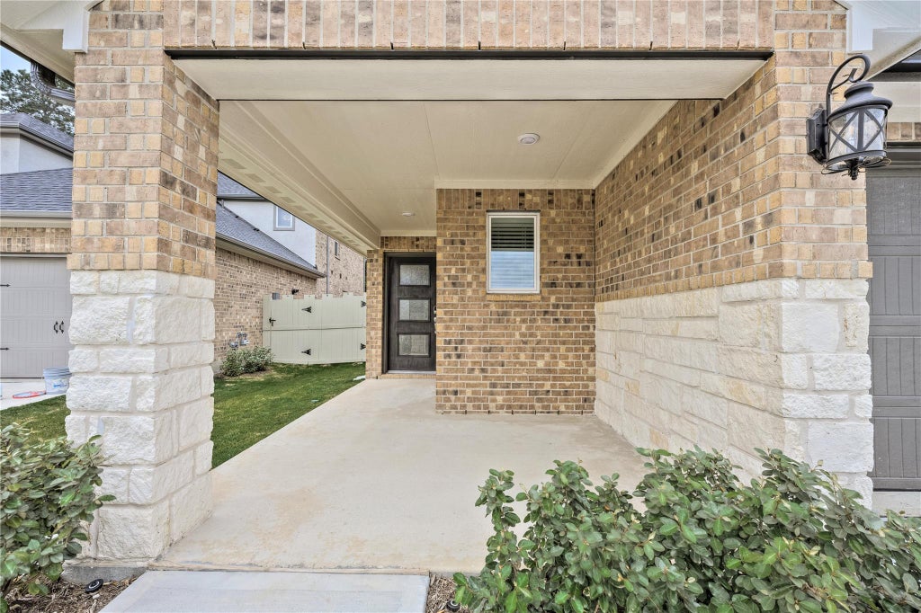 Photo of 17502 Rosette Grass Drive, Conroe, TX 77385 (MLS # 23992397)