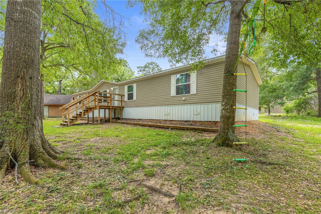 Photo of 7362 Washington Avenue, Montgomery, TX 77316 (MLS # 9515387)
