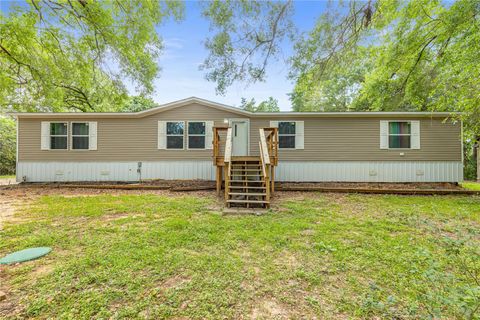 Photo of 7362 Washington Avenue, Montgomery, TX 77316 (MLS # 9515387)