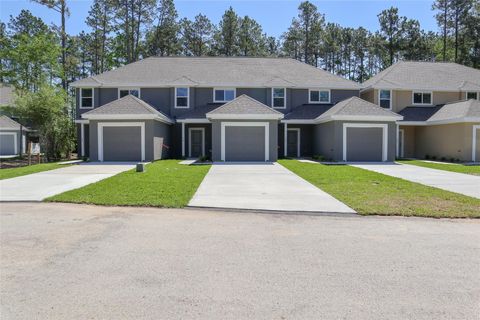 Photo of 118 Artesian Way, New Caney, TX 77357 (MLS # 10316812)