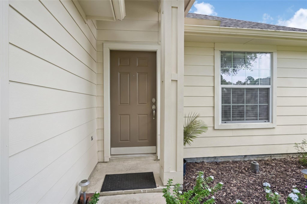 Photo of 12943 Palm Leaf Court, Houston, TX 77044 (MLS # 68805694)