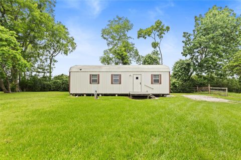 Photo of 12039 Anderson Road, Willis, TX 77318 (MLS # 17947099)