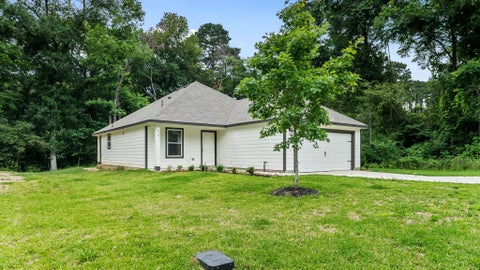 Photo of 410 Pimmit Hill Run, Conroe, TX 77316 (MLS # 87621369)