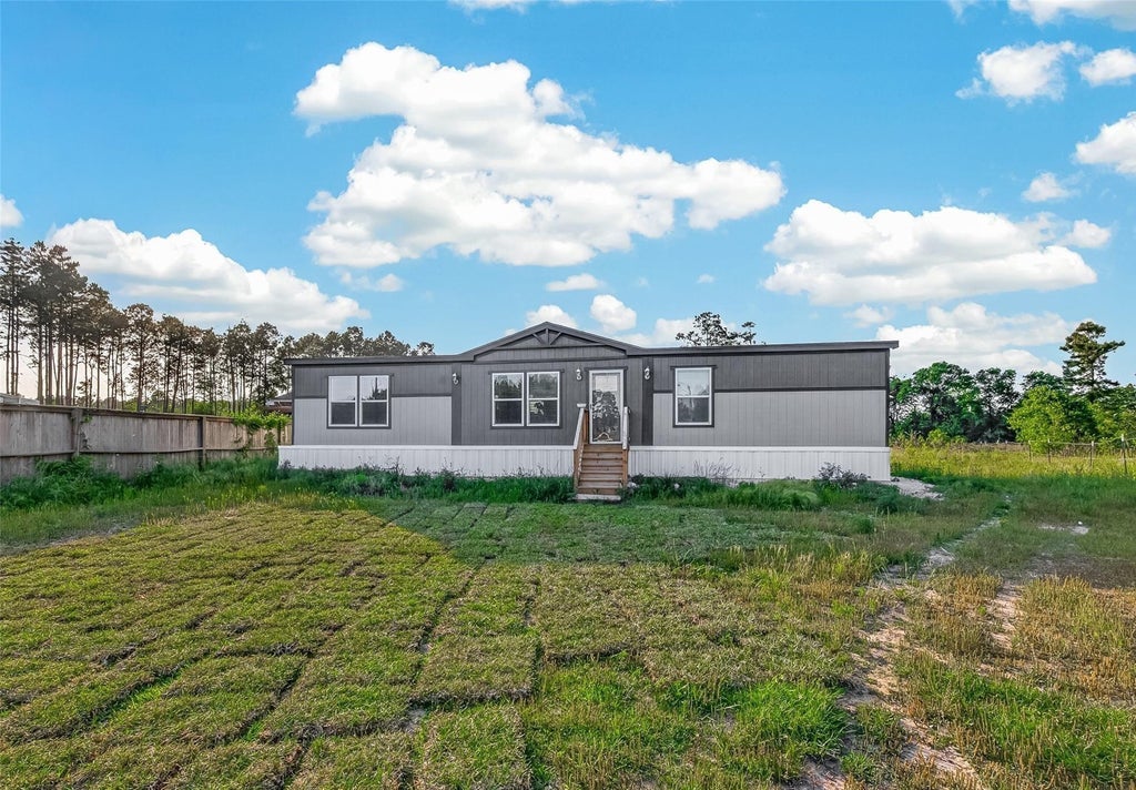 Photo of 63 County Road 5012, Cleveland, TX 77327 (MLS # 74109309)
