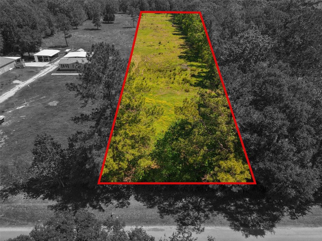 Photo of 1013 County Road 2050, Hull, TX 77564 (MLS # 48491828)