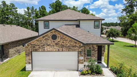 Photo of 97 Courageous Side Way, Magnolia, TX 77354 (MLS # 86014103)