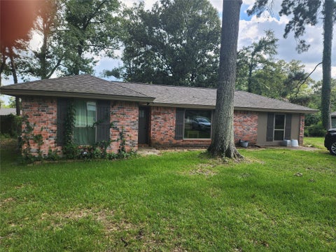 Photo of 213 Holly Lane, Woodbranch, TX 77357 (MLS # 22445734)