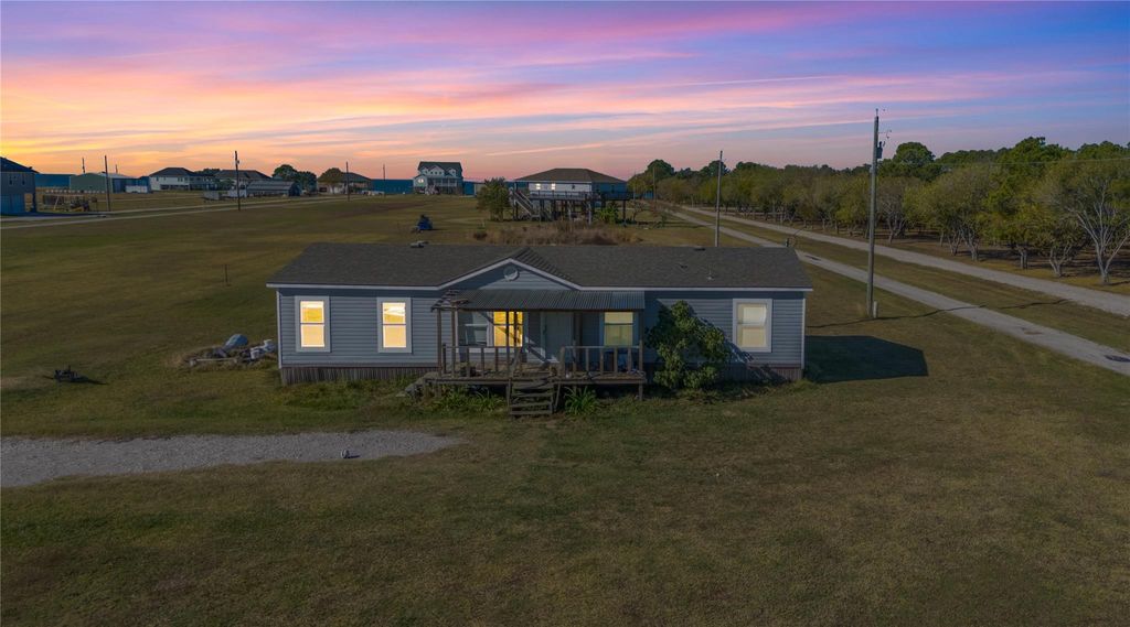 Photo of 4423 W Bayshore Road, Anahuac, TX 77514 (MLS # 49872970)