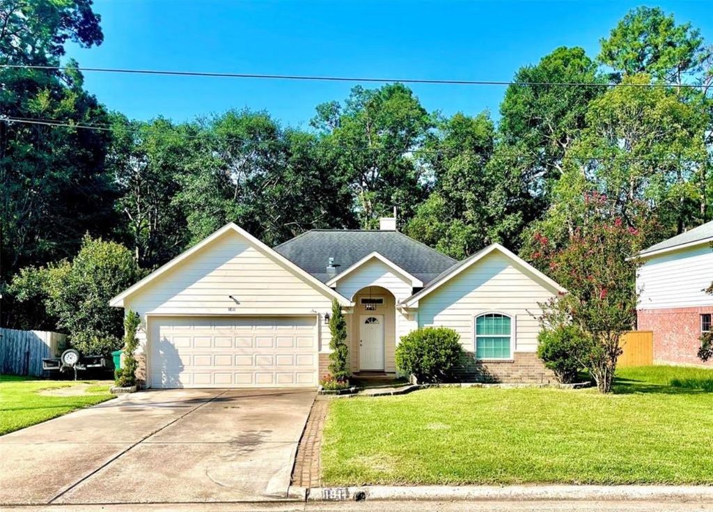 Photo of 1811 Tickner Street, Conroe, TX 77301 (MLS # 31617068)
