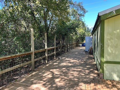 Photo of 403 W Worsham Street, Willis, TX 77378 (MLS # 56044454)