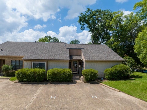 Photo of 1401 Avenue O #H, Huntsville, TX 77340 (MLS # 52209012)