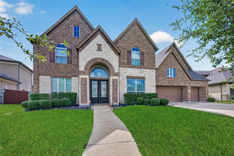 Photo of 10210 Olivia View Ln Ln, Cypress, TX 77433 (MLS # 74434093)