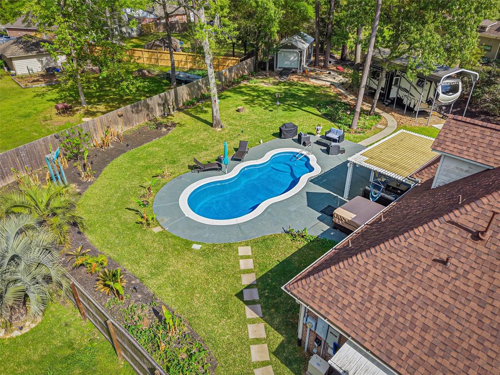 Photo of 910 Apollo Street, New Caney, TX 77357 (MLS # 42526364)