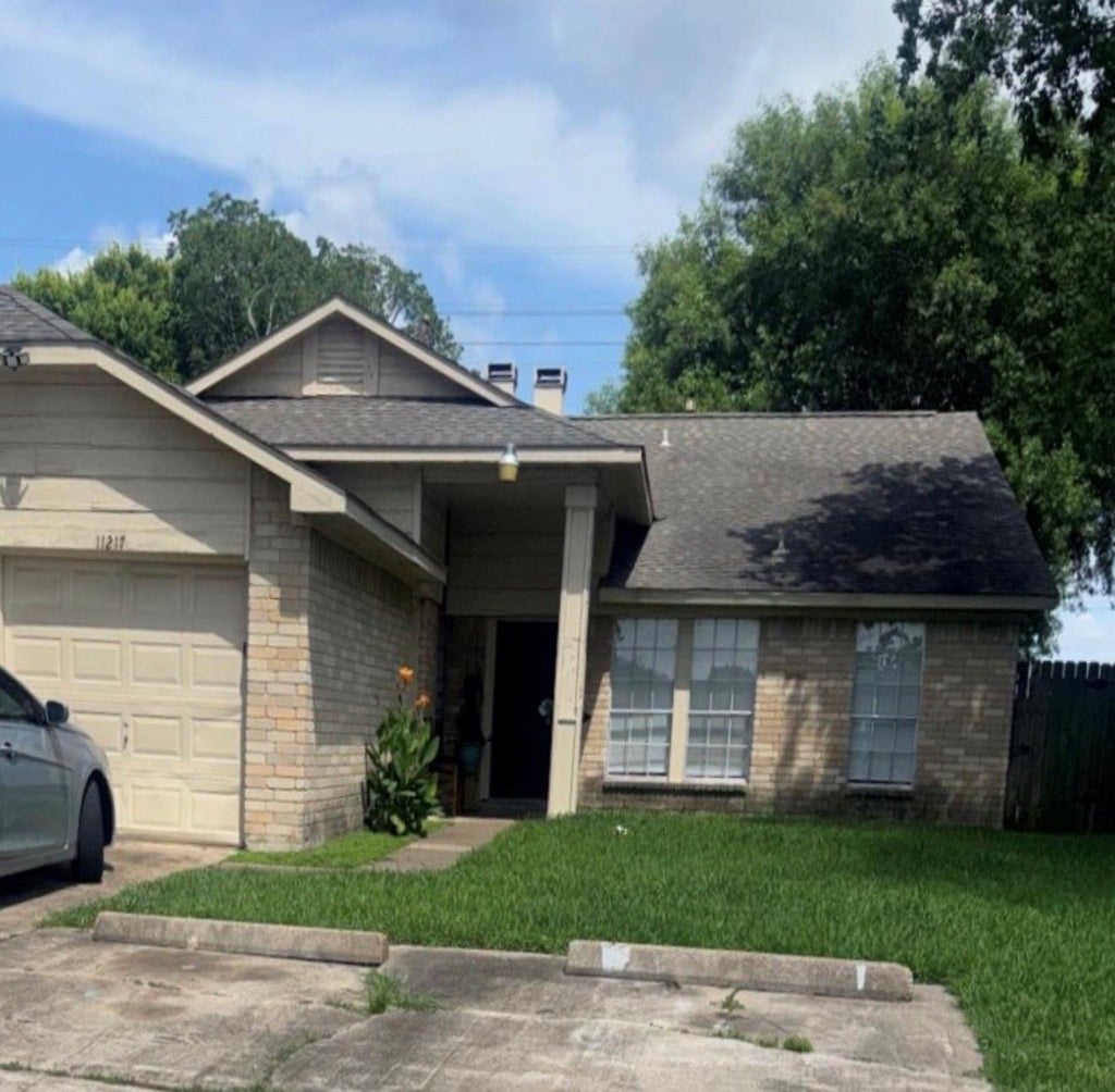Photo of 11217 Pender Lane, Houston, TX 77477 (MLS # 30638250)