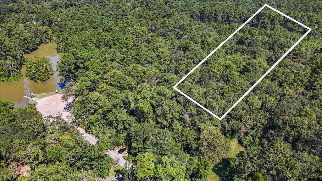 Photo of 0 Dunnam Place, Kingwood, TX 77345 (MLS # 10728584)