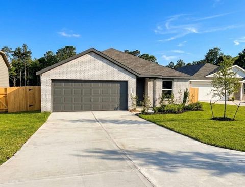 Photo of 335 Parkin Court, Conroe, TX 77303 (MLS # 94219564)