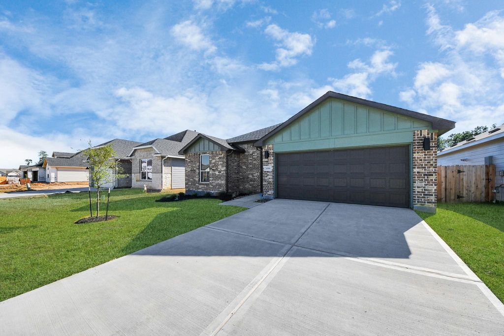 Photo of 10310 Woodhill Spa Lane, Cleveland, TX 77327 (MLS # 93035216)