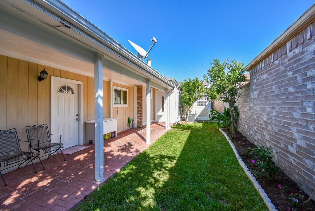 Photo of 9311 Stockwell Drive, Houston, TX 77083 (MLS # 64659349)