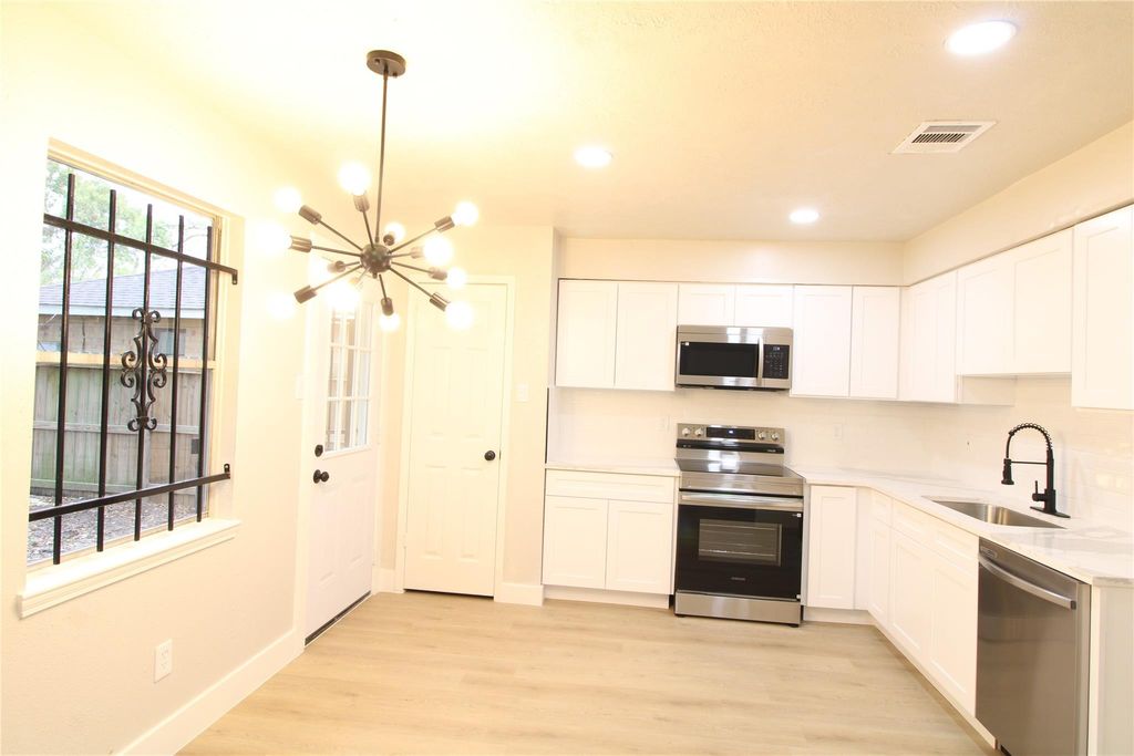 Photo of 3210 Wuthering Heights Drive, Houston, TX 77045 (MLS # 79094903)