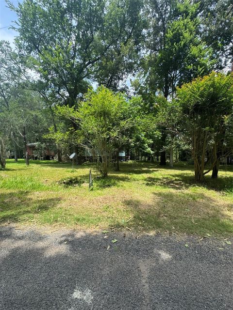 Tiny photo for 45 County Road 2859, Cleveland, TX 77327 (MLS # 11462444)
