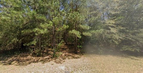 Photo of 0 Middle Parkway Dr, Conroe, TX 77302 (MLS # 97510719)