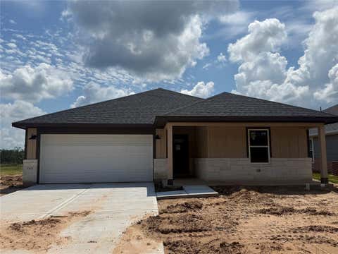 Photo of 10435 Sugar Mill Dr, Conroe, TX 77306 (MLS # 32431423)