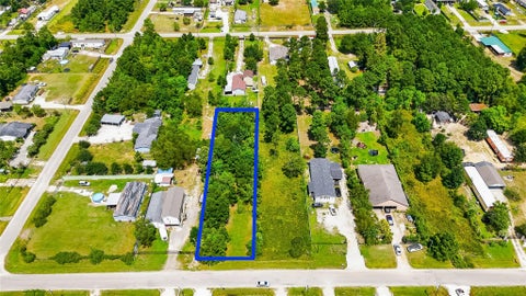 Photo of 801 County Road 3479j, Cleveland, TX 77327 (MLS # 11991496)