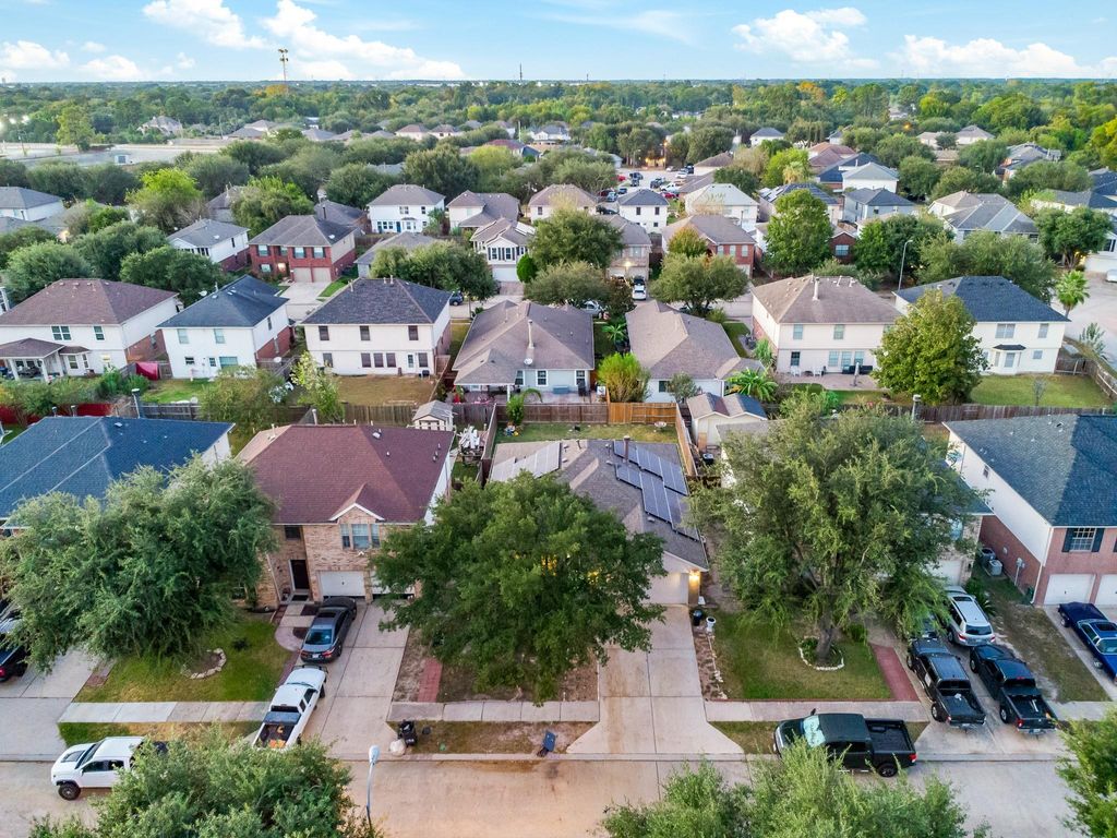 Photo of 5914 Stirring Winds Lane, Houston, TX 77086 (MLS # 58182126)