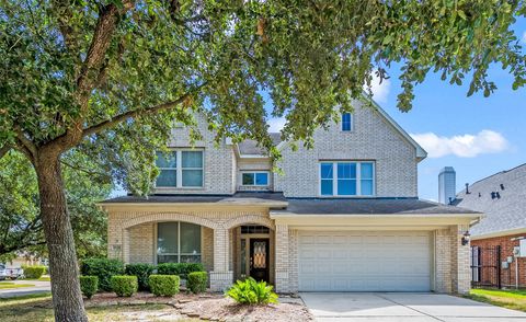 Photo of 10130 Lakeside Gables Drive, Houston, TX 77065 (MLS # 26618590)