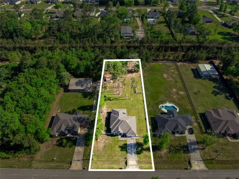 Photo of 27684 Rio Blanco Drive, Splendora, TX 77372 (MLS # 40044317)