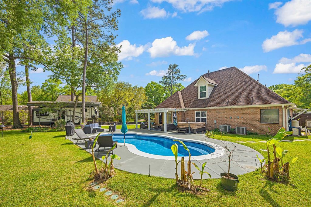 Photo of 910 Apollo Street, New Caney, TX 77357 (MLS # 6974855)