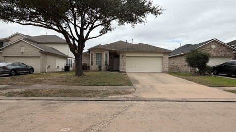 Photo of 7407 Oakwood Canyon Drive, Cypress, TX 77433 (MLS # 41789339)