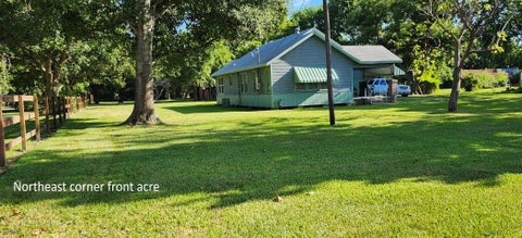 Photo of 3006 Massey Tompkins Road, Baytown, TX 77521 (MLS # 90846868)