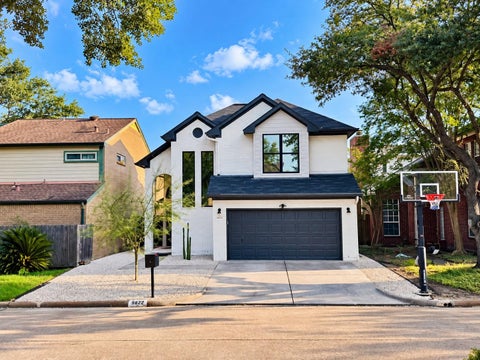 Photo of 9822 Oak Point Drive, Houston, TX 77055 (MLS # 65743164)