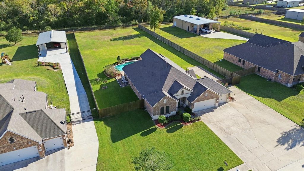 Photo of 15314 Icet Creek Ave Ave, Mont Belvieu, TX 77523 (MLS # 53554909)