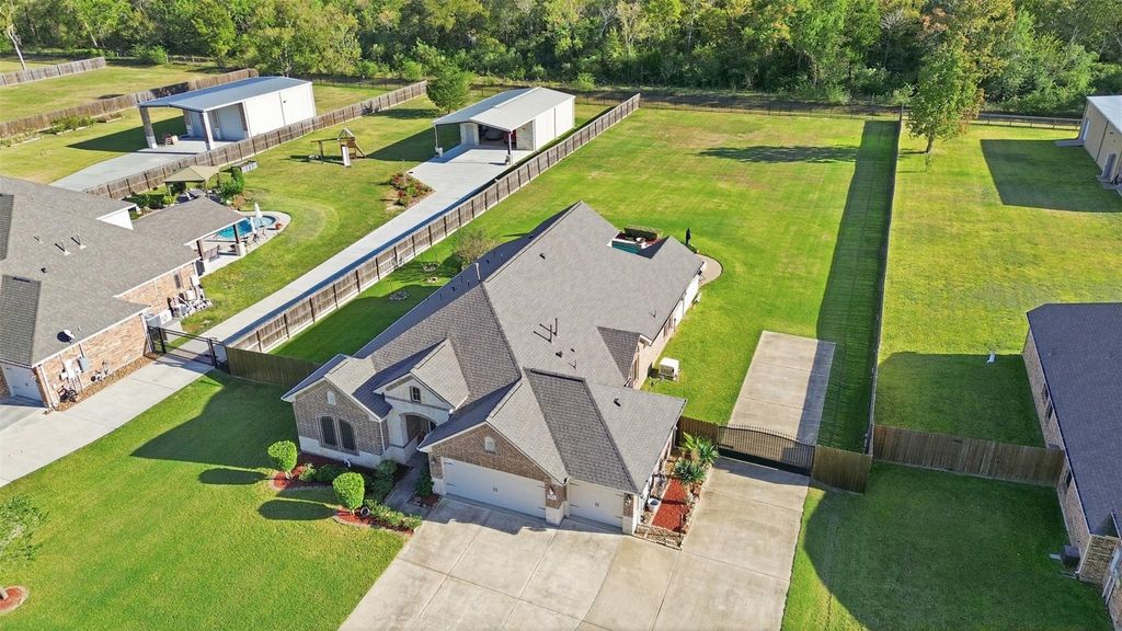 Photo of 15314 Icet Creek Ave Ave, Mont Belvieu, TX 77523 (MLS # 53554909)