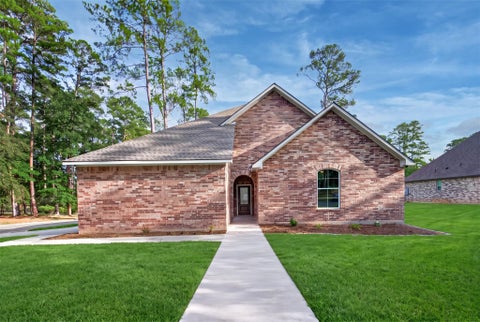 Photo of 1304 River Oaks Drive, Huntsville, TX 77340 (MLS # 30875236)