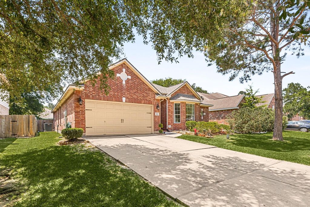 Photo of 26867 Castlecliff Lane, Kingwood, TX 77339 (MLS # 80319908)