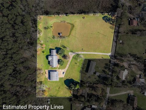 Photo of 40 Roy Webb Road, Huntsville, TX 77320 (MLS # 83370268)