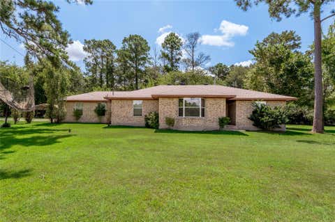 Photo of 65 Paisano Lane, Huntsville, TX 77340 (MLS # 79867709)