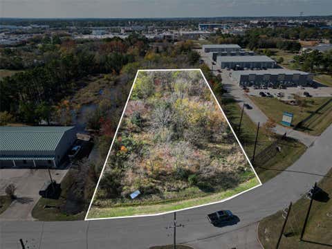 Photo of 0 Commercial Park Road, Tomball, TX 77375 (MLS # 23319815)