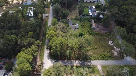 Photo of 19626 Forest Dr W, New Caney, TX 77357 (MLS # 67314948)