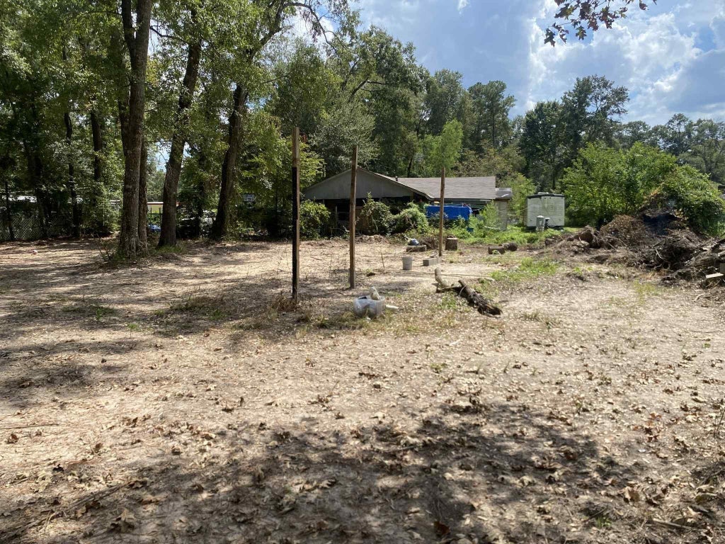 Photo of 19626 Forest Dr W, New Caney, TX 77357 (MLS # 67314948)
