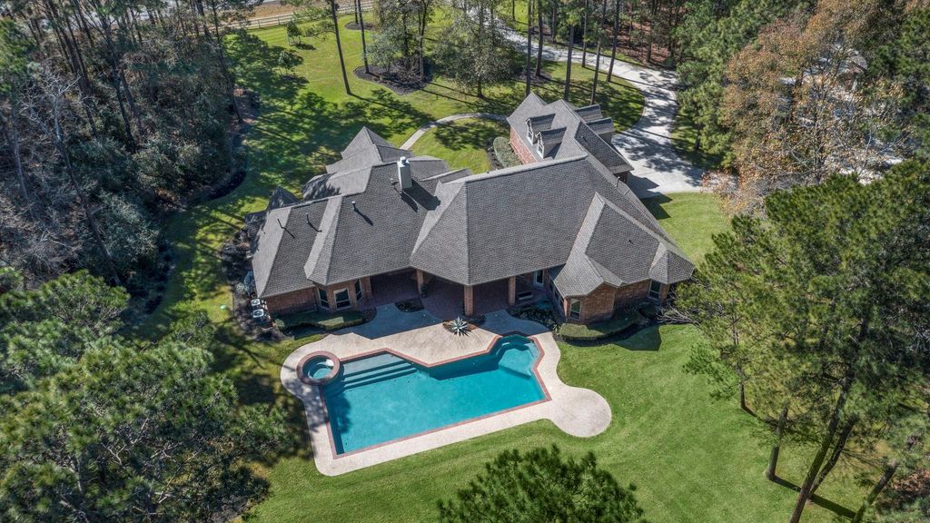Photo of 11302 Lake Forest Drive, Conroe, TX 77384 (MLS # 87744615)