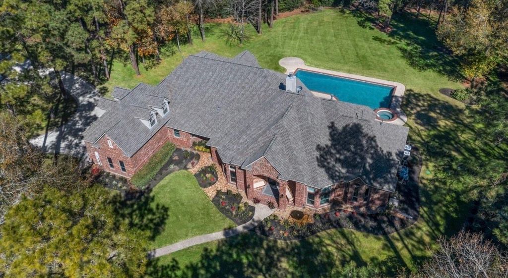 Photo of 11302 Lake Forest Drive, Conroe, TX 77384 (MLS # 87744615)