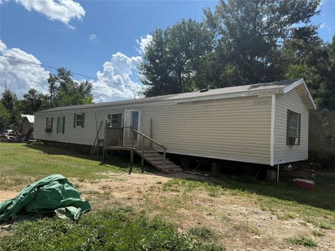 Photo of 3048 County Road 3550, Cleveland, TX 77327 (MLS # 11575531) Photo of 3048 County Road 3550, Cleveland, TX 77327 (MLS # 11575531)