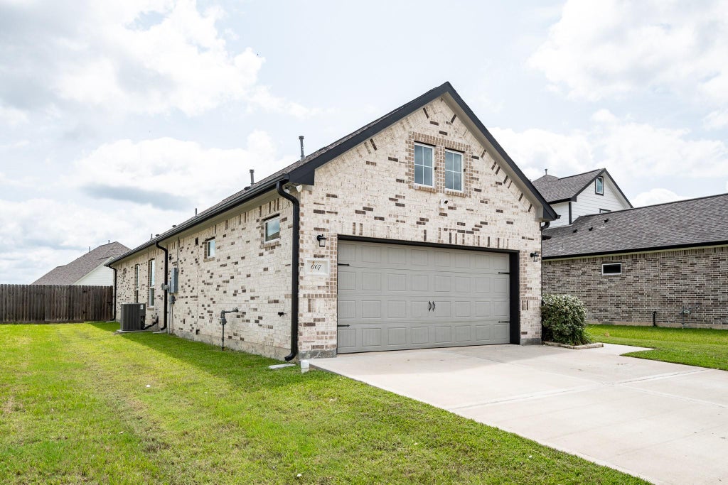Photo of 607 Rain Cloud Drive, Baytown, TX 77523 (MLS # 29465015)