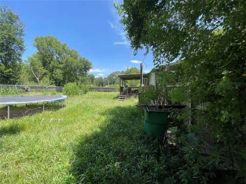 Photo of 7720 County Road 171, Alvin, TX 77511 (MLS # 44421960)