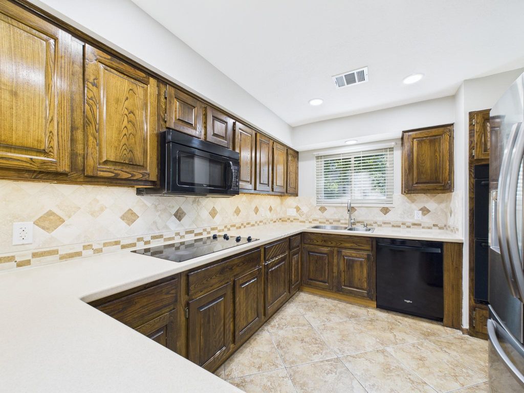 Photo of 3018 Highland Laurels Drive, Houston, TX 77345 (MLS # 41768846)